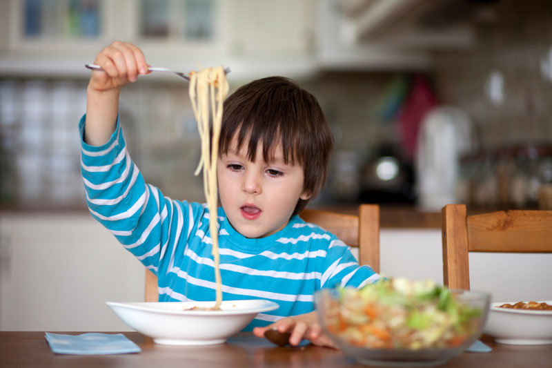 Boy eating Dinner