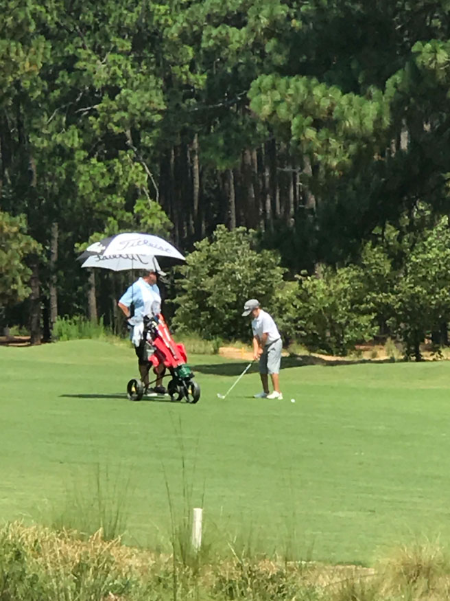 Vince Golfing